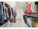 Walk-in closet featuring built-in shelving and ample storage space at 1206 Mountainside Nw Trce, Kennesaw, GA 30152