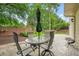 Backyard patio with an outdoor dining area, ideal for entertaining guests at 1206 Mountainside Nw Trce, Kennesaw, GA 30152