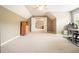 Bonus room with open doors, offering versatile space and a ceiling fan at 1206 Mountainside Nw Trce, Kennesaw, GA 30152