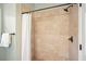 Walk-in shower with tiled walls and bronze fixtures at 1206 Mountainside Nw Trce, Kennesaw, GA 30152