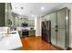 Modern kitchen with shaker cabinets, stainless steel appliances, subway tile backsplash, and beautiful hardwood floors at 1607 Boulder Walk Se Dr, Atlanta, GA 30316