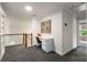 Bright office area with built-in desk and cabinetry at 1607 Boulder Walk Se Dr, Atlanta, GA 30316