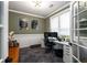 Stylish office space with modern lighting, comfortable seating, and a large window at 1607 Boulder Walk Se Dr, Atlanta, GA 30316