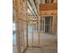 Spacious unfinished basement with wooden framing, with light entering from windows, ready for customization at 195 Silvercrest Dr, Acworth, GA 30101