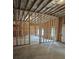 Spacious unfinished basement with wooden framing, with light entering from windows, ready for customization at 195 Silvercrest Dr, Acworth, GA 30101