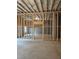 Spacious unfinished basement with wooden framing, with light entering from windows, ready for customization at 195 Silvercrest Dr, Acworth, GA 30101
