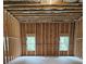 Unfinished basement framed with wood, with light entering from windows, ready for customization, offers versatility at 195 Silvercrest Dr, Acworth, GA 30101