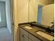 Bathroom with a double sink vanity, undermount sinks, and modern black fixtures at 195 Silvercrest Dr, Acworth, GA 30101