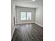 Bedroom with hardwood floors and window at 195 Silvercrest Dr, Acworth, GA 30101