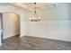 Dining Room with hardwood floors, wainscoting and chandelier at 195 Silvercrest Dr, Acworth, GA 30101
