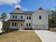 Charming two-story home with a well-manicured lawn and a classic white exterior at 195 Silvercrest Dr, Acworth, GA 30101