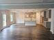 Spacious open-concept kitchen features gray cabinets, island, and stainless appliances at 195 Silvercrest Dr, Acworth, GA 30101
