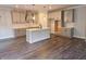 Well-lit kitchen features an island, modern cabinets and stainless steel appliances at 195 Silvercrest Dr, Acworth, GA 30101