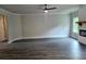 Spacious living room featuring a modern fireplace, neutral paint, and hardwood floors at 195 Silvercrest Dr, Acworth, GA 30101