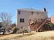 View of the back exterior with siding and a wooden deck at 4217 Mill Grove Sw Ln, Smyrna, GA 30082