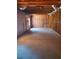 Unfinished basement with exposed ceiling, concrete floor and ready for customization at 4217 Mill Grove Sw Ln, Smyrna, GA 30082