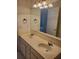 Bright bathroom features a double sink vanity and a large mirror at 4217 Mill Grove Sw Ln, Smyrna, GA 30082