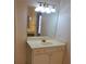 Bathroom features a bright large mirror over vanity at 4217 Mill Grove Sw Ln, Smyrna, GA 30082