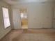 Bedroom with one window, neutral carpet, door to bath, with natural light at 4217 Mill Grove Sw Ln, Smyrna, GA 30082