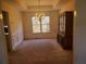 Dining room with carpet, cabinet, and decorative molding at 4217 Mill Grove Sw Ln, Smyrna, GA 30082