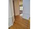 View of the hardwood flooring in the foyer with molding at 4217 Mill Grove Sw Ln, Smyrna, GA 30082