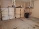 Spacious two-car garage with concrete flooring and two overhead doors at 4217 Mill Grove Sw Ln, Smyrna, GA 30082