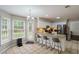 Bright kitchen with granite countertops, breakfast bar, stainless steel appliances, and plenty of natural light at 8895 Club River Dr, Roswell, GA 30076