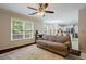 Comfortable living room filled with natural light, open to the kitchen and breakfast area at 8895 Club River Dr, Roswell, GA 30076