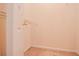 Bright walk-in closet with rod and shelf for organization at 136 Parkstone Way, Marietta, GA 30066