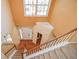 Bright foyer with staircase, hardwood floors, and high ceilings with a large window at 136 Parkstone Way, Marietta, GA 30066