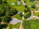 Aerial view of a home in a Gathering-friendly neighborhood with a community pool at 5077 Fieldview Dr, Douglasville, GA 30135