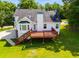 A large, private backyard showcasing an expansive deck perfect for entertaining at 5077 Fieldview Dr, Douglasville, GA 30135