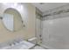 Bright bathroom featuring a modern sink with stylish fixtures and a shower-tub combination at 5077 Fieldview Dr, Douglasville, GA 30135