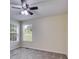 Bedroom with plush carpeting, and two windows that offer ample natural light at 5077 Fieldview Dr, Douglasville, GA 30135