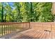 Wood deck overlooking green trees at 1333 Laura Ln, Austell, GA 30168