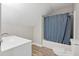 Bathroom featuring a sink with vanity, a toilet, and a shower with a curtain at 1333 Laura Ln, Austell, GA 30168