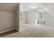 Bedroom featuring plush carpeting and natural light at 1333 Laura Ln, Austell, GA 30168