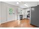 Eat-in kitchen with white cabinets and stainless steel appliances at 1333 Laura Ln, Austell, GA 30168