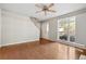 Living room featuring hardwood floors, a large window, and neutral paint at 1333 Laura Ln, Austell, GA 30168