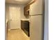 Kitchen features appliances, cabinetry and door entrance at 17301 Waldrop Cv, Decatur, GA 30034