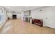 Open basement space showcasing wood-look floors, kitchenette, and lots of bright, natural light at 2585 Drew Valley Ne Rd, Brookhaven, GA 30319