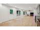 Spacious basement with wood floors, recessed lighting, and a door leading to the backyard at 2585 Drew Valley Ne Rd, Brookhaven, GA 30319