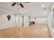 Basement with wood floors, recessed lighting, and a partial bar area with marble countertops at 2585 Drew Valley Ne Rd, Brookhaven, GA 30319