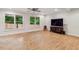 Spacious living room features hardwood floors and large windows at 2585 Drew Valley Ne Rd, Brookhaven, GA 30319