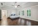 Bright and spacious main bedroom with tray ceilings and hardwood floors at 2585 Drew Valley Ne Rd, Brookhaven, GA 30319