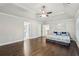 Bright and spacious main bedroom with tray ceilings and hardwood floors at 2585 Drew Valley Ne Rd, Brookhaven, GA 30319