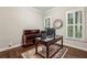 Bright home office with hardwood flooring, desk, hutch, and natural light at 2585 Drew Valley Ne Rd, Brookhaven, GA 30319
