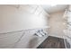 Walk-in closet with wire shelving and wood floor at 3845 Glen Ian Dr, Loganville, GA 30052