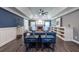 Large living room offers tray ceiling, fireplace, and modern touches for a sophisticated design at 3845 Glen Ian Dr, Loganville, GA 30052