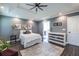Main bedroom features tray ceiling, fan, ensuite bath, decorative plants, and lots of room at 3845 Glen Ian Dr, Loganville, GA 30052
